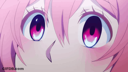 Close Up Of Person's Eyes With Pink Hair GIF