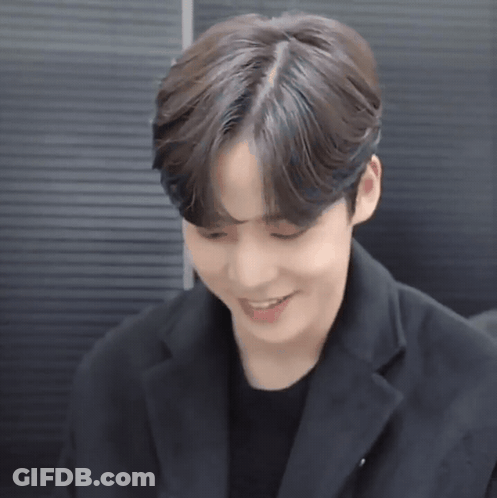 Close Up Of Person's Face In Black Jacket GIF