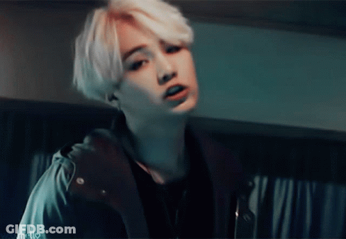 Close Up Of Person's Face In Dark Room GIF