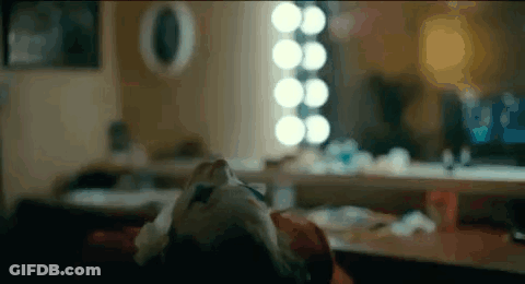 Close Up Of Person's Face In Dressing Room GIF