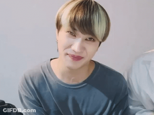 Close Up Of Person's Face In Gray Shirt GIF