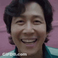 Close Up Of Person's Face On Pink Background GIF