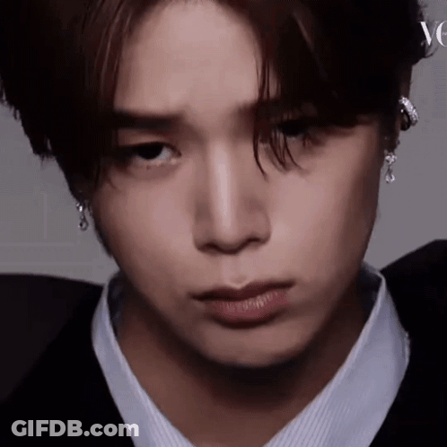 Close Up Of Person's Face With Earrings GIF