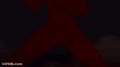 Close Up Of Person's Face With Glowing Orange Eyes GIF