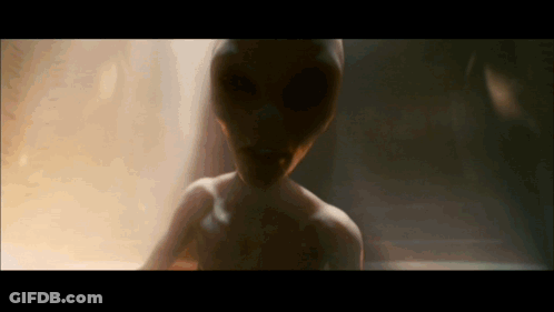 Close Up Of Person's Face With Large Eyes GIF