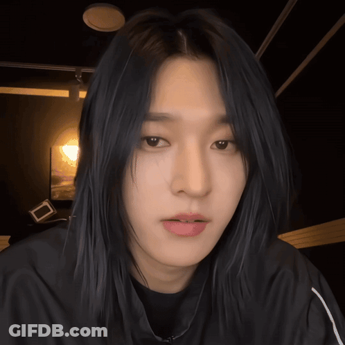 Close Up Of Person's Face With Long Hair GIF