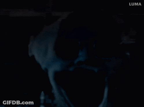 Close Up Of Person's Face With Luma Logo GIF