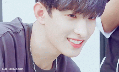 Close Up Of Person's Face With Necklace GIF