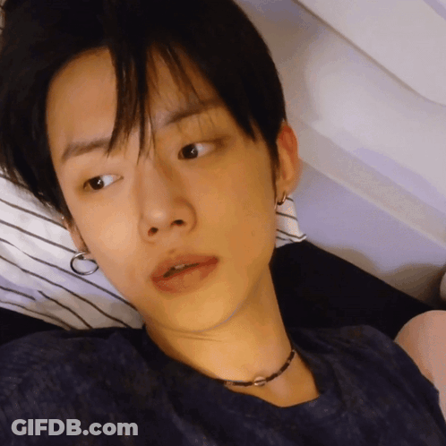 Close Up Of Person's Face With Necklace GIF