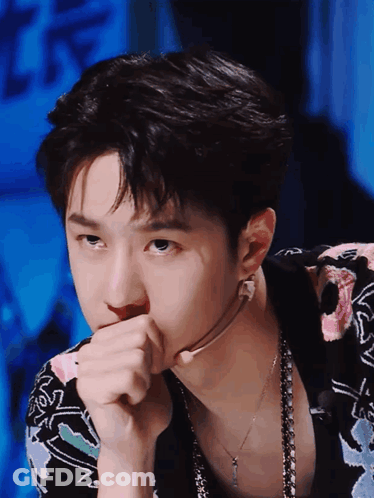 Close Up Of Person's Face With Necklace GIF