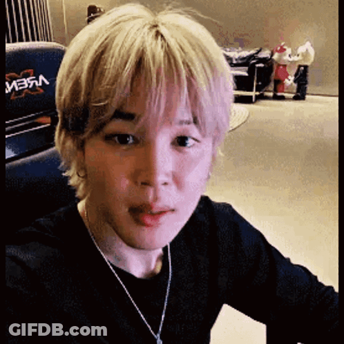 Close Up Of Person's Face With Necklace GIF