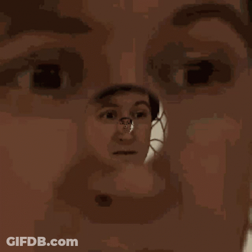 Close Up Of Person's Face With Reflection GIF