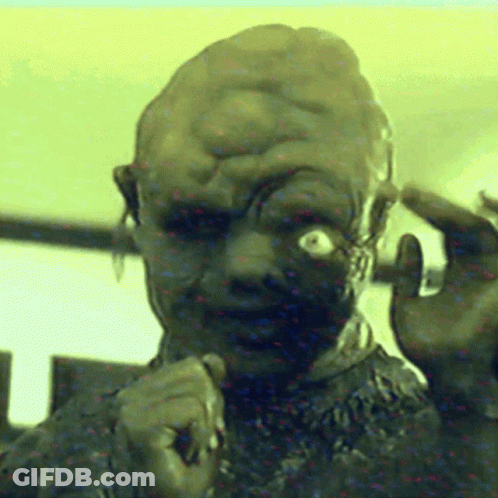 Close-Up Of Person's Face With Very Large Head GIF