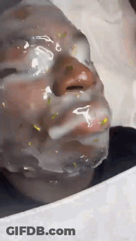 Close Up Of Person's Face Wrapped In Plastic GIF