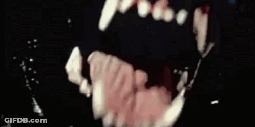 Close Up Of Person's Mouth With Teeth GIF