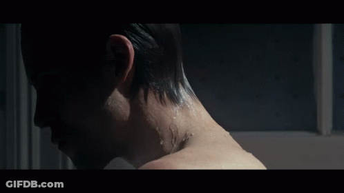Close Up Of Person's Neck And Shoulder GIF