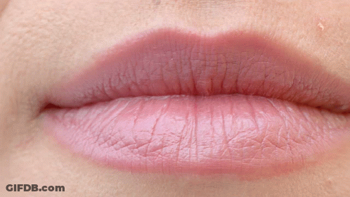 Close Up Of Person's Teeth And Pink Lip GIF