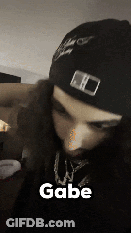 Close Up Of Person Wearing Black Beanie With Gabe GIF