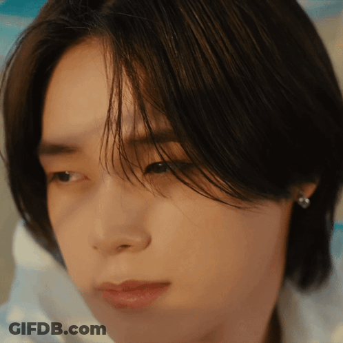 Close Up Of Person Wearing Earrings GIF