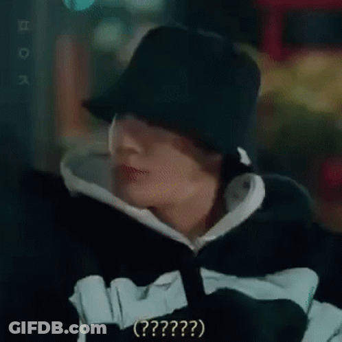 Close Up Of Person Wearing Hat And Hoodie Making Funny Face GIF