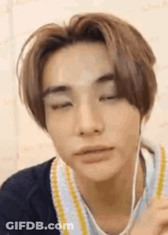 Close Up Of Person Wearing Headphones GIF