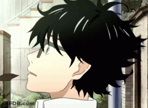 Close Up Of Person With Black Hair And Green Eyes GIF