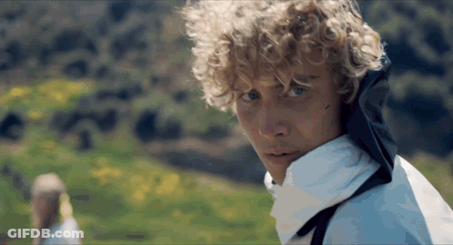 Close Up Of Person With Curly Blonde Hair GIF