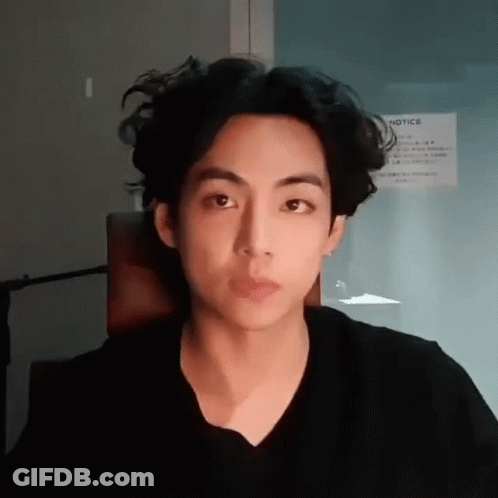 Close Up Of Person With Curly Hair GIF