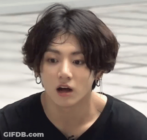 Close Up Of Person With Earrings And Black Shirt GIF