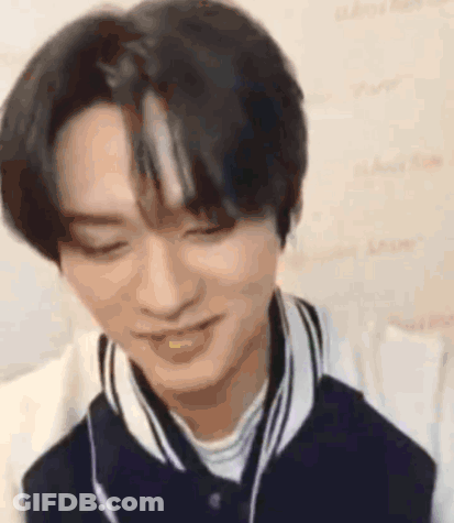 Close Up Of Person With Eyes Closed And Jacket GIF