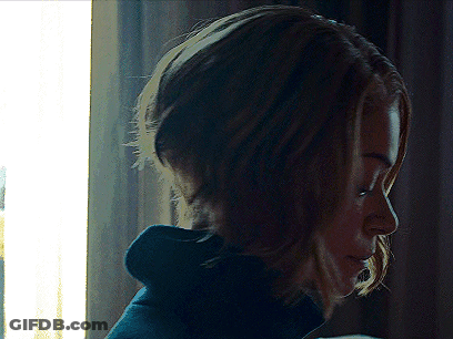 Close Up Of Person With Window Behind GIF