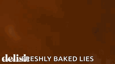 Close Up Of Pie In Glass Dish Saying Delifreshly Baked Lies GIF