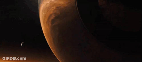 Close Up Of Planet With Crescent Moon GIF