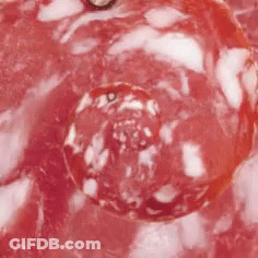 Close Up Of Red Liquid With Bubbles GIF