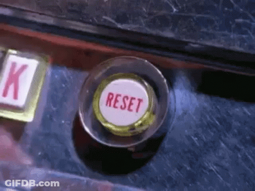 Close Up Of Reset Button On Machine GIF