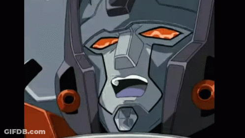 Close Up Of Robot Face With Orange Eyes GIF