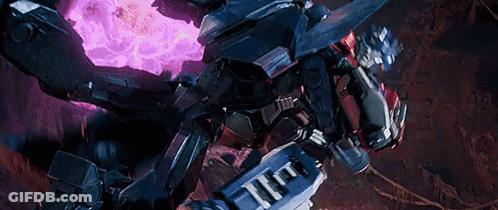 Close Up Of Robot Fighting Another Robot In Dark Room GIF
