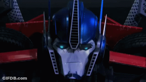 Close Up Of Robot Head With Blue Eyes In Car GIF