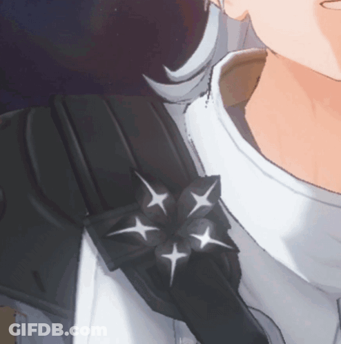 Close-Up Of Shoulder With Black Flower And White Stars GIF