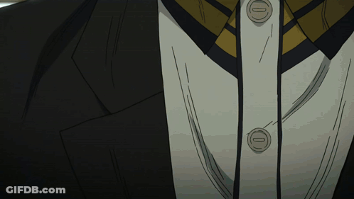Close Up Of Suit And Tie With Letter O Buttons GIF
