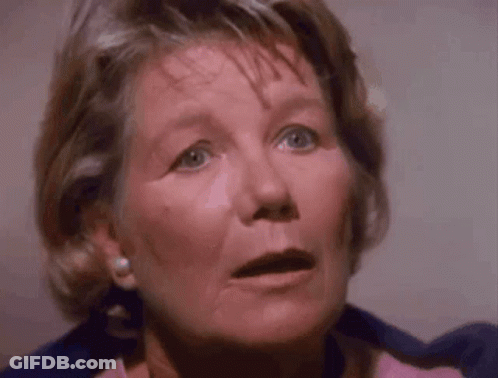 Close-Up Of Surprised Woman's Face GIF