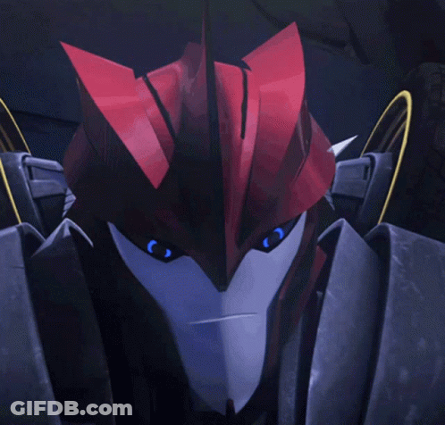 Close Up Of Transformer With Red Head GIF