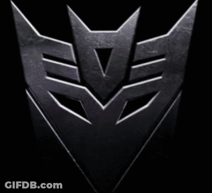Close Up Of Transformers Logo On Black Background GIF