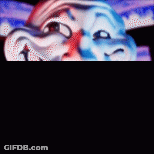 Close Up Of Troll Face With Big Teeth GIF