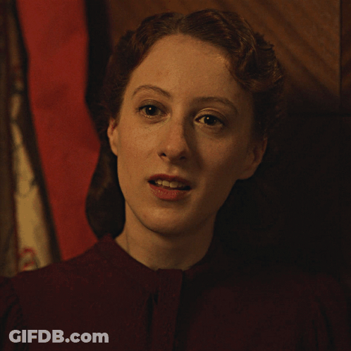 Close Up Of Woman Eyes Closed In Dark Room GIF