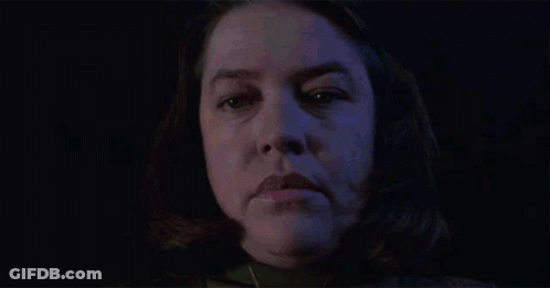 Close Up Of Woman Face Against Blue Background GIF