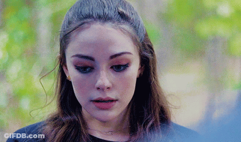 Close Up Of Woman Face With Blue Background GIF
