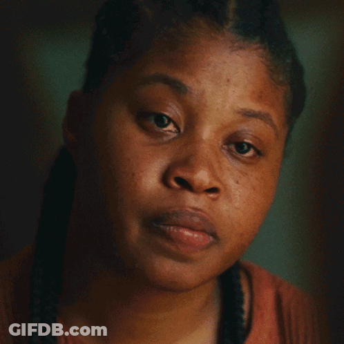 Close Up Of Woman Face With Braids GIF