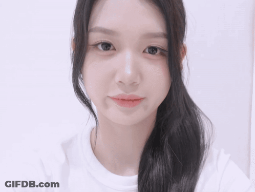 Close Up Of Woman Face With Ponytail GIF