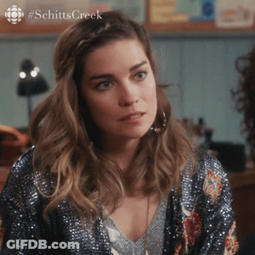 Close Up Of Woman Face With Schittscreek GIF